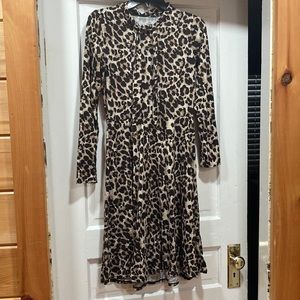Leopard print dress with neck tie.